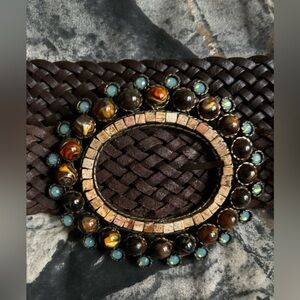 Brown braided leather belt with oval buckle adorned with blue and brown stones